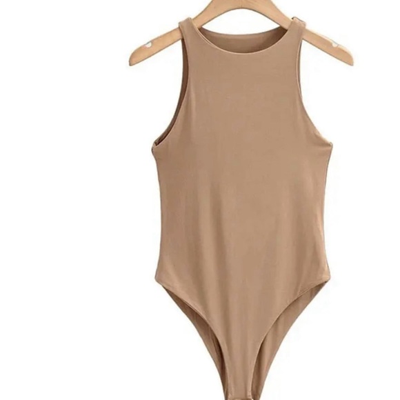 Super soft and stretchy bodysuit with 3 snap bottom. NKD Collections boutique - Picture 3 of 6